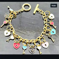 Cross My Heart – Gold Stainless Steel Charm Bracelet