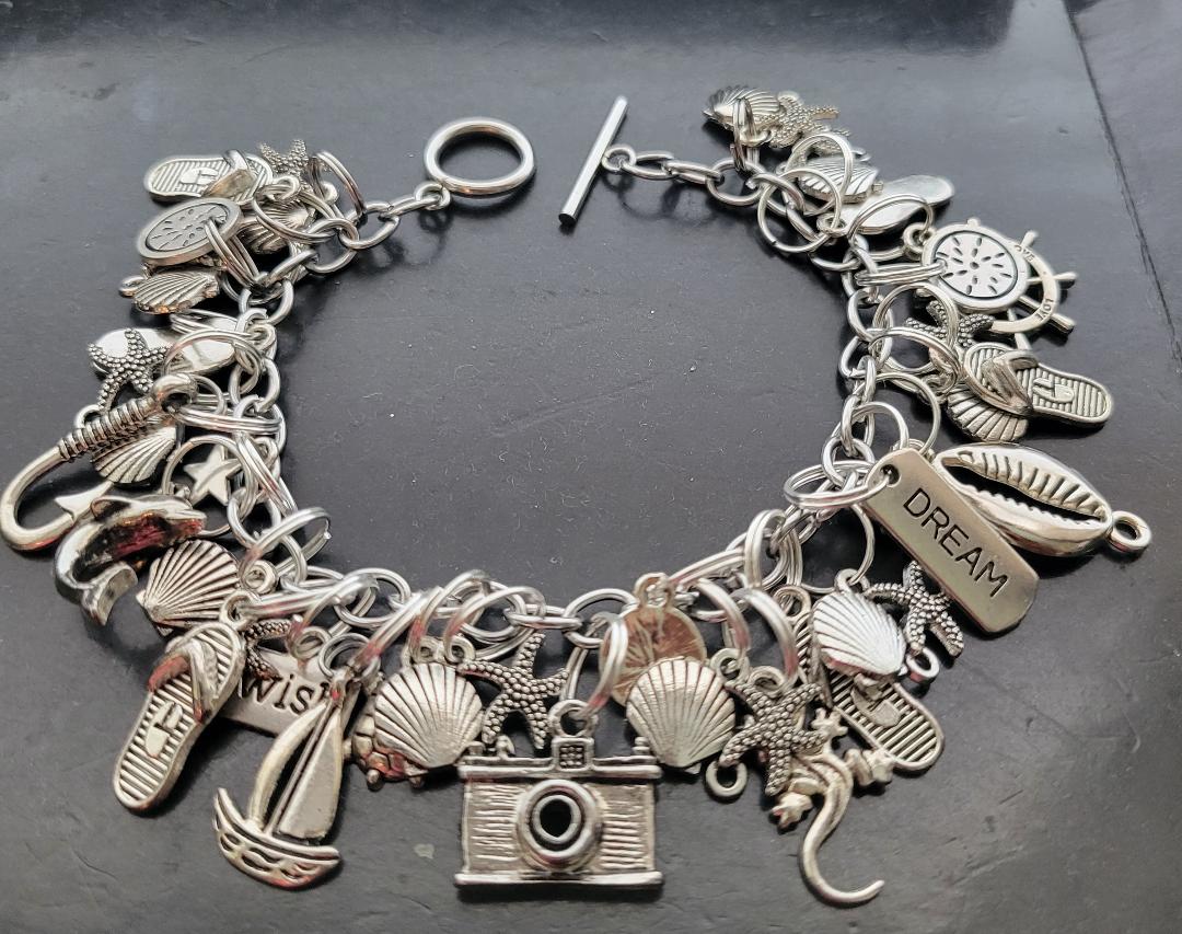 Vacay themed charmed bracelet